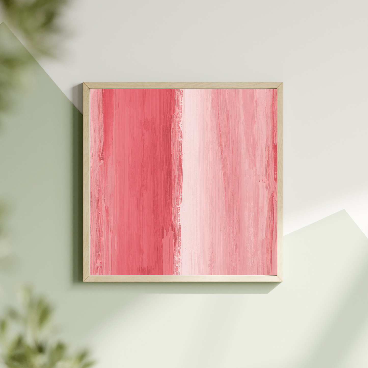 Abstract roze wit schilderij met verticale penseelstroken in koraalroze en wit in witte lijst liggend op lichte ondergrond met groene plant – fris wall art overloop