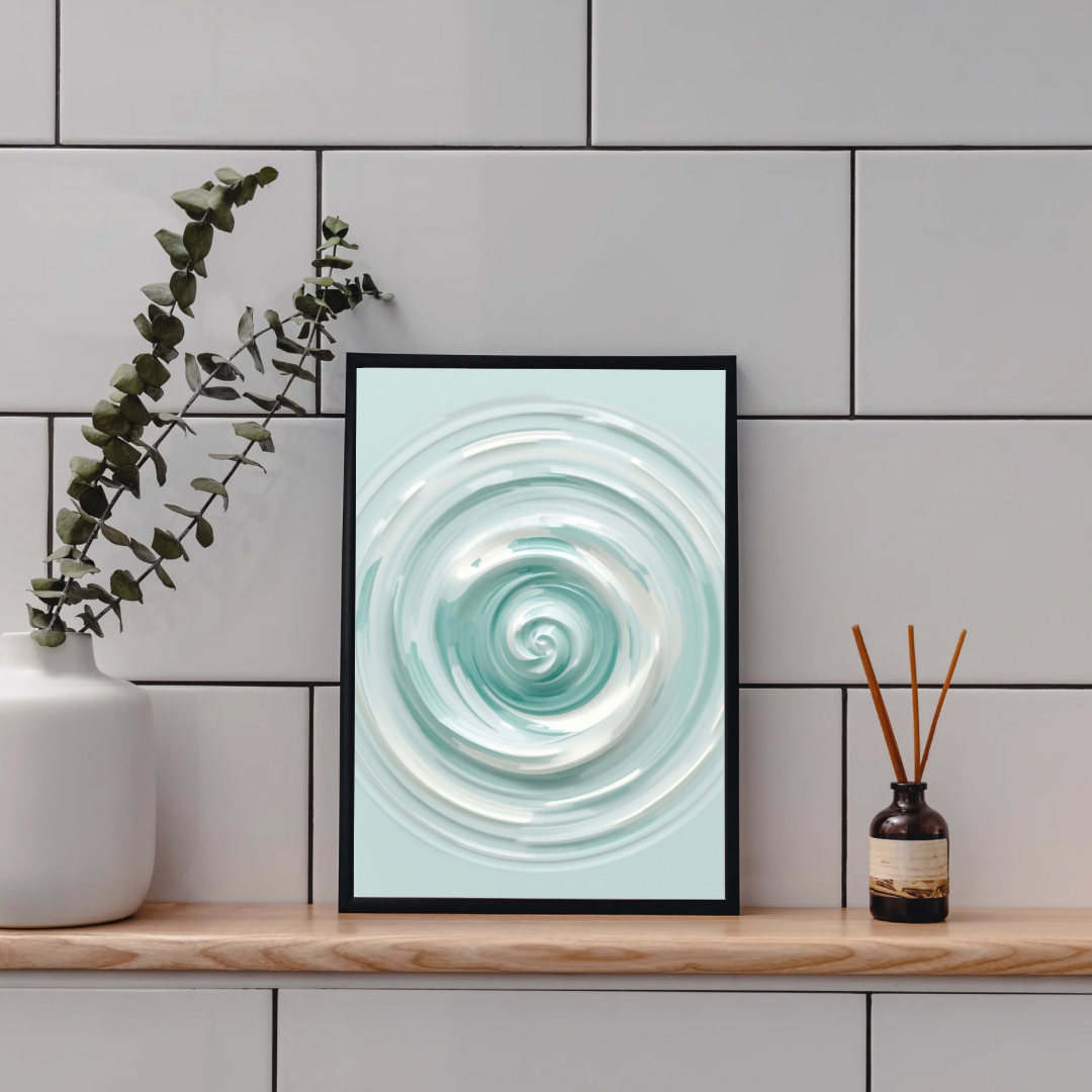 Abstract water swirl mint schilderij in zwarte lijst staand op houten plank aan grijze tegelmuur naast witte vaas met eucalyptus en bruine diffuser – abstract wall art toilet