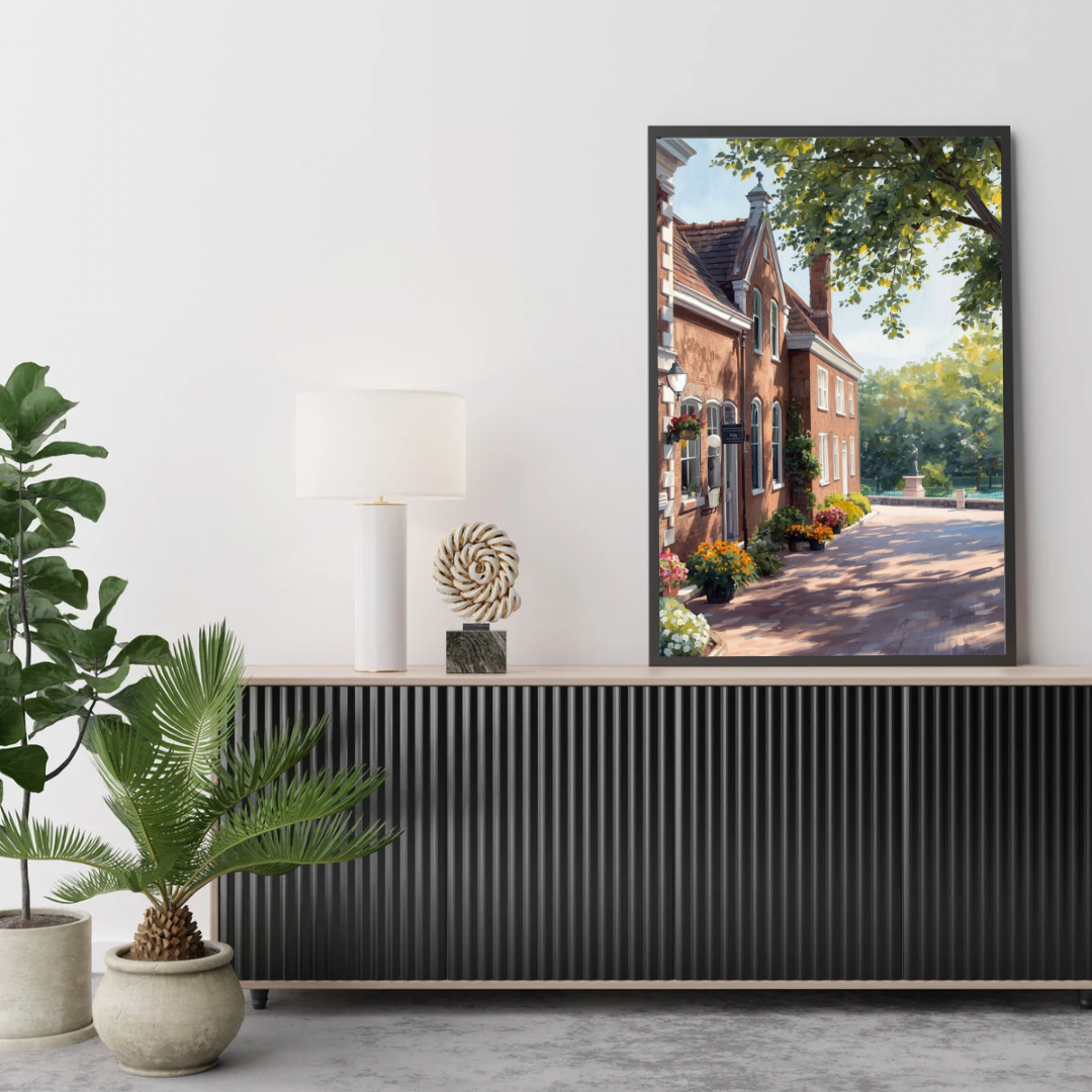 Breda villalaan schilderij in donkere lijst aan witte muur boven donker tv-meubel met plant en decoraties – realistisch wall art woonkamer
