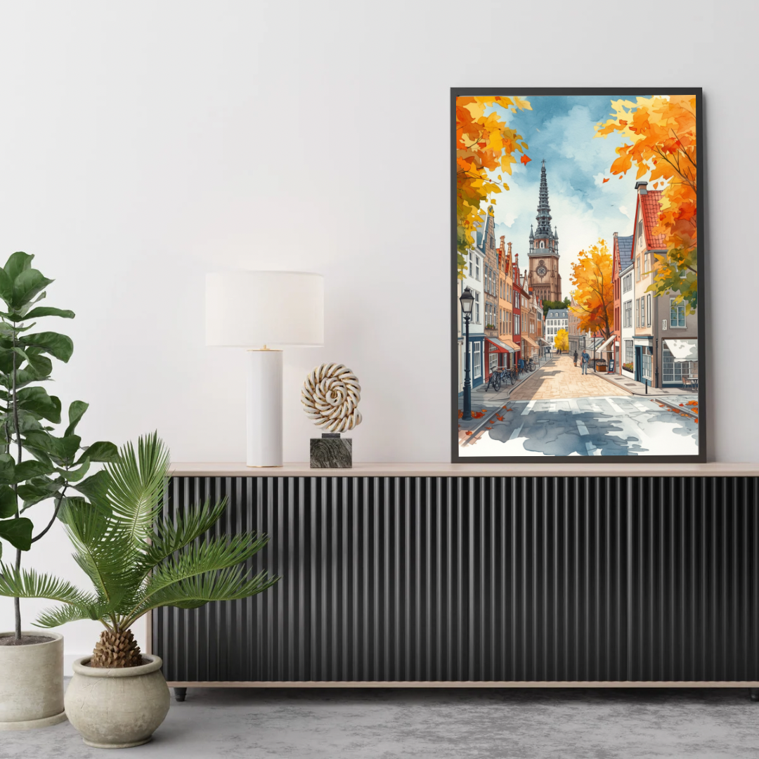 Arnhem herfststraat schilderij in donkere lijst aan witte muur boven donker tv-meubel met plant en decoraties – aquarel wall art woonkamer
