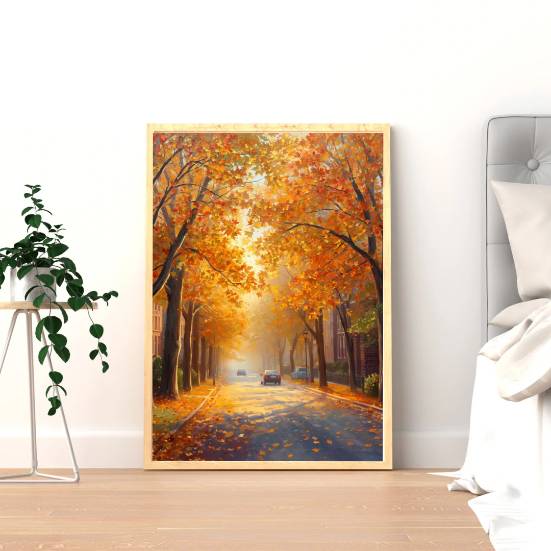 Deventer herfst bomentunnel schilderij als set van twee in zwarte lijst staand op licht houten sidetable met groene plant tegen witte muur – olieverf wall art woonkamer
