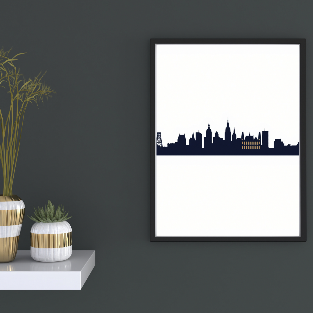 Zwarte skyline canvas schilderij in zwarte lijst aan donkergrijze muur in hal met decoratieve vaas en kaarsen — minimalistisch wanddecoratie
