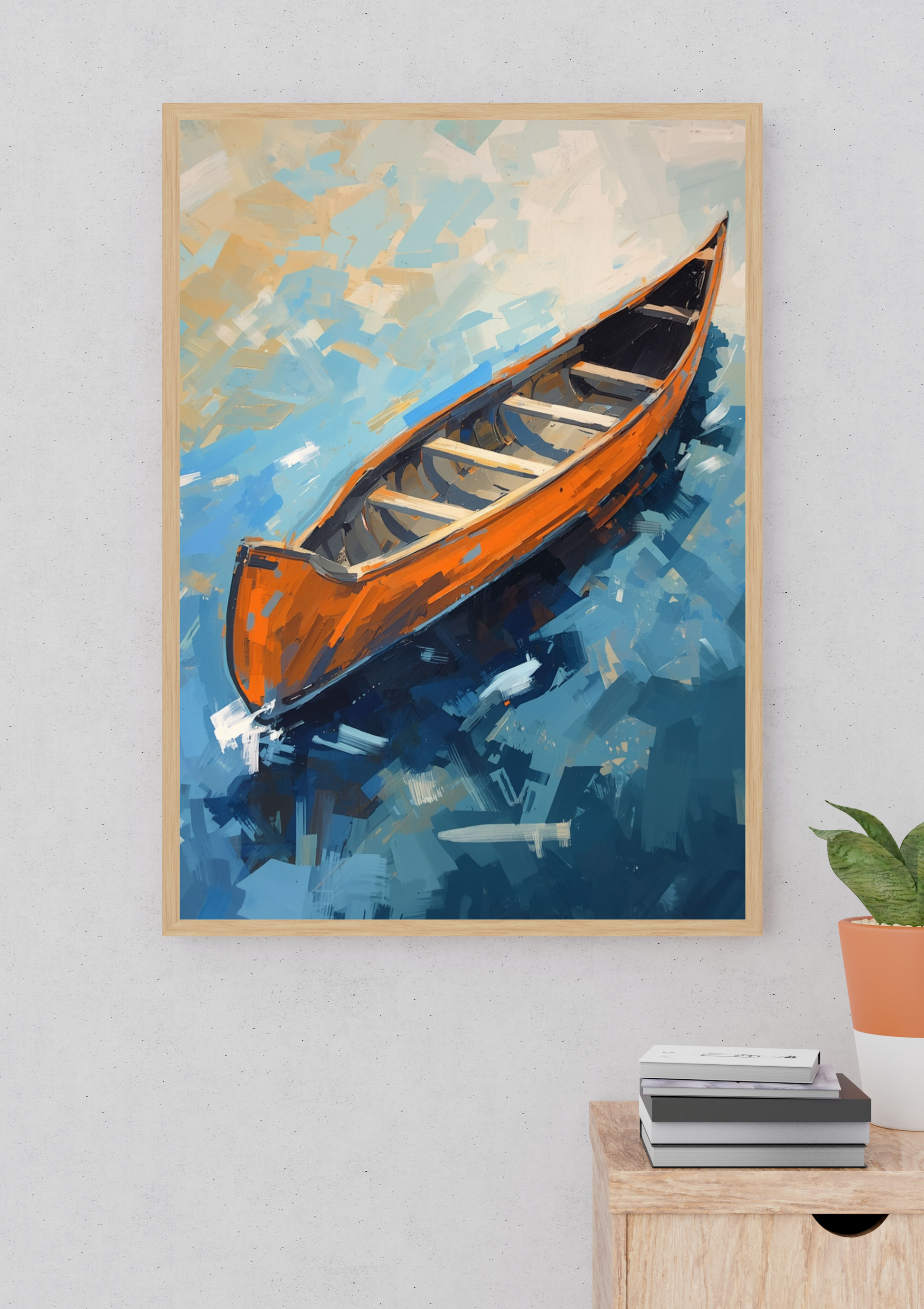 Boot canvas schilderij met oranje kano op blauw water in gouden lijst aan witte muur naast plant in moderne woonruimte — premium wanddecoratie
